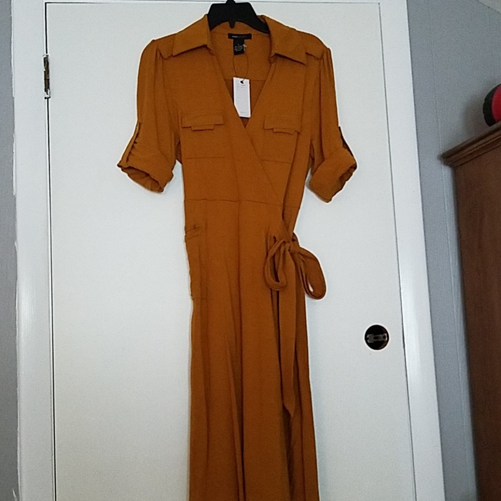 BCBG faux wrap dress. NEW WITH TAGS